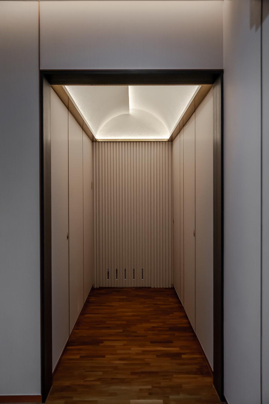 Modern Hallway with Parquet Floor and Feature Wall