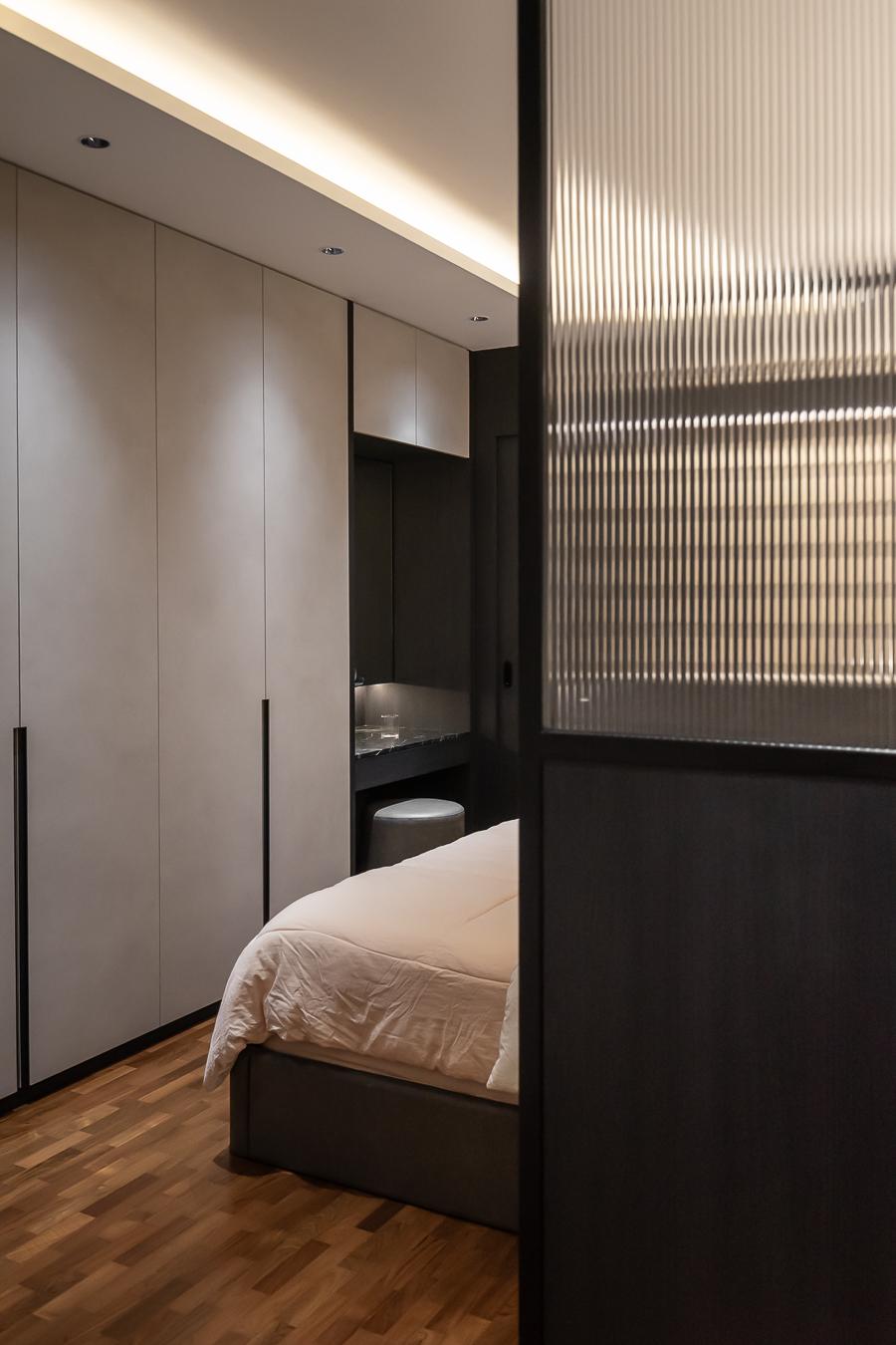 Modern Bedroom with Cove Lighting and Wardrobe