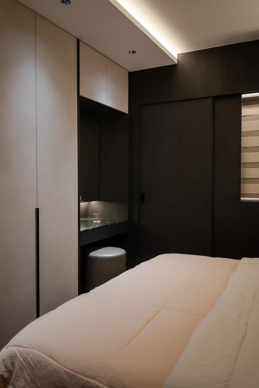 Modern Bedroom with Cove Lighting and Wardrobe