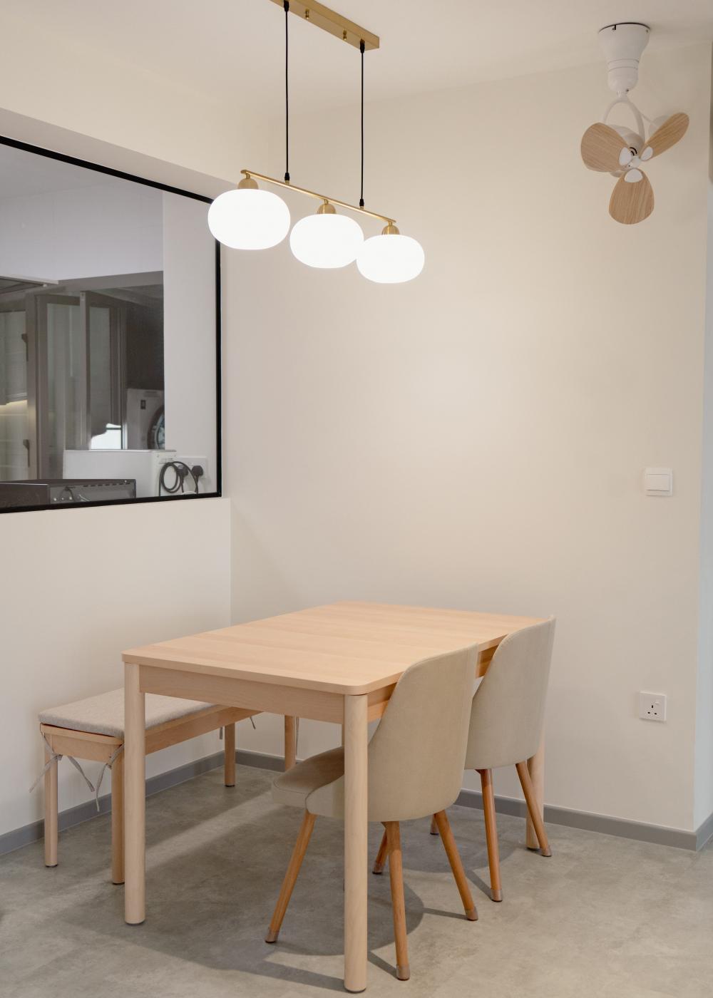 Scandinavian Dining Room with Drop Light and Glass Door