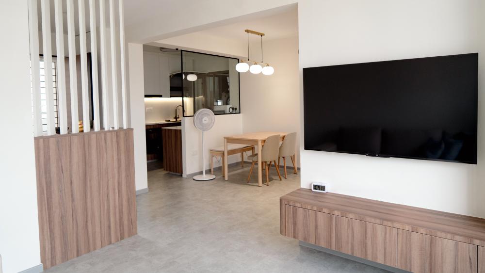 Scandinavian Living Room with TV Console and Glass Door