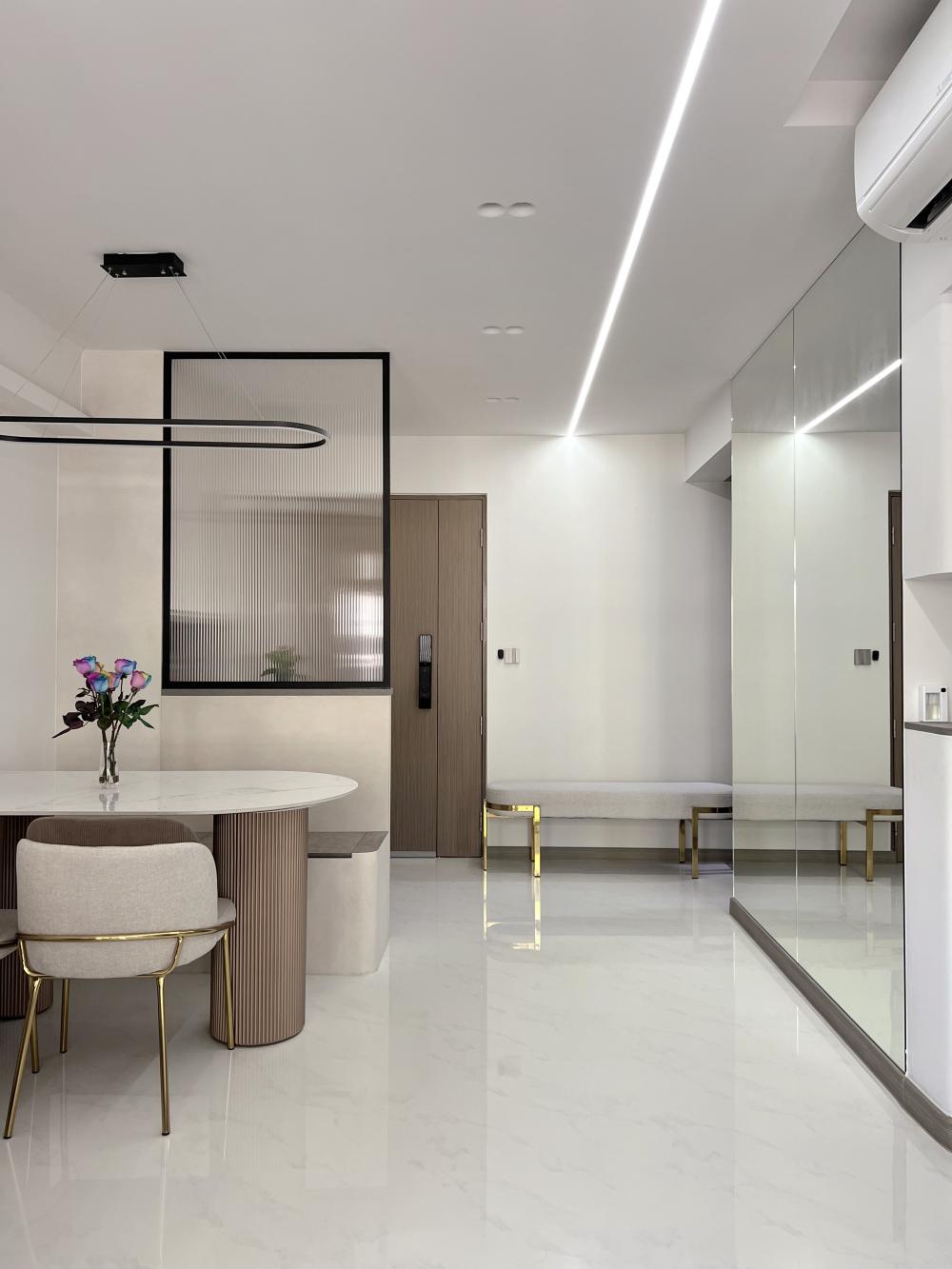 Modern Living Room with Homogeneous Tiles and Mirror