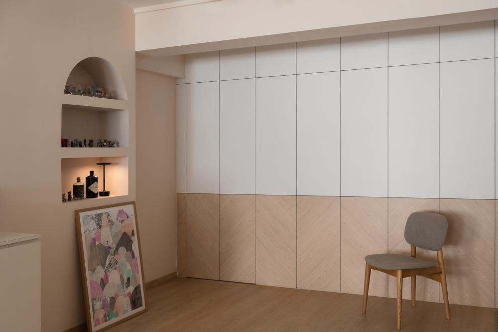 Scandinavian Hallway with Artwork and Dining Chairs