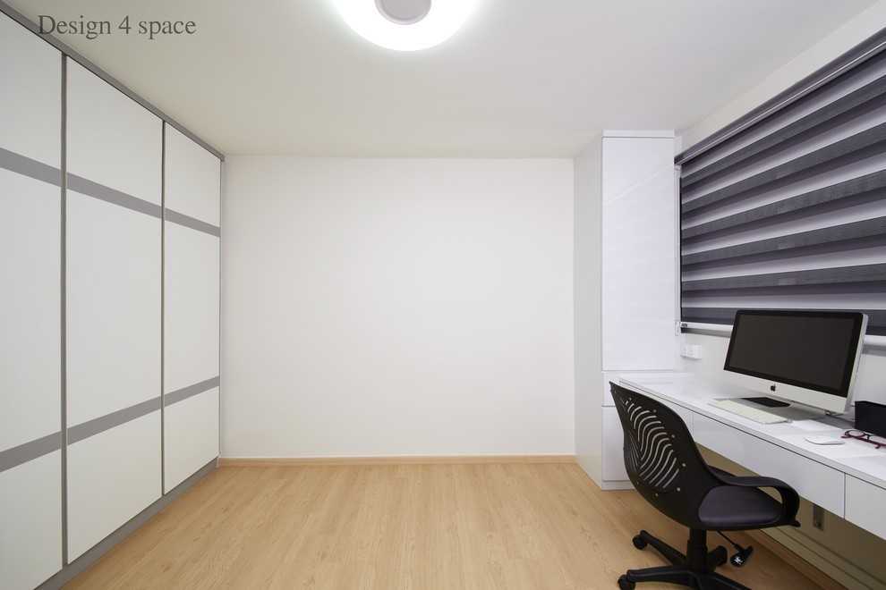 Contemporary Study with Cove Lighting and Bookcases