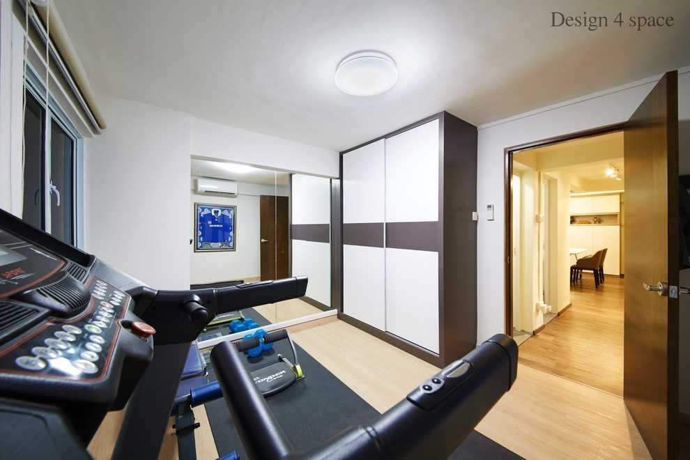 Contemporary Home Gym with TV Console and Sofa