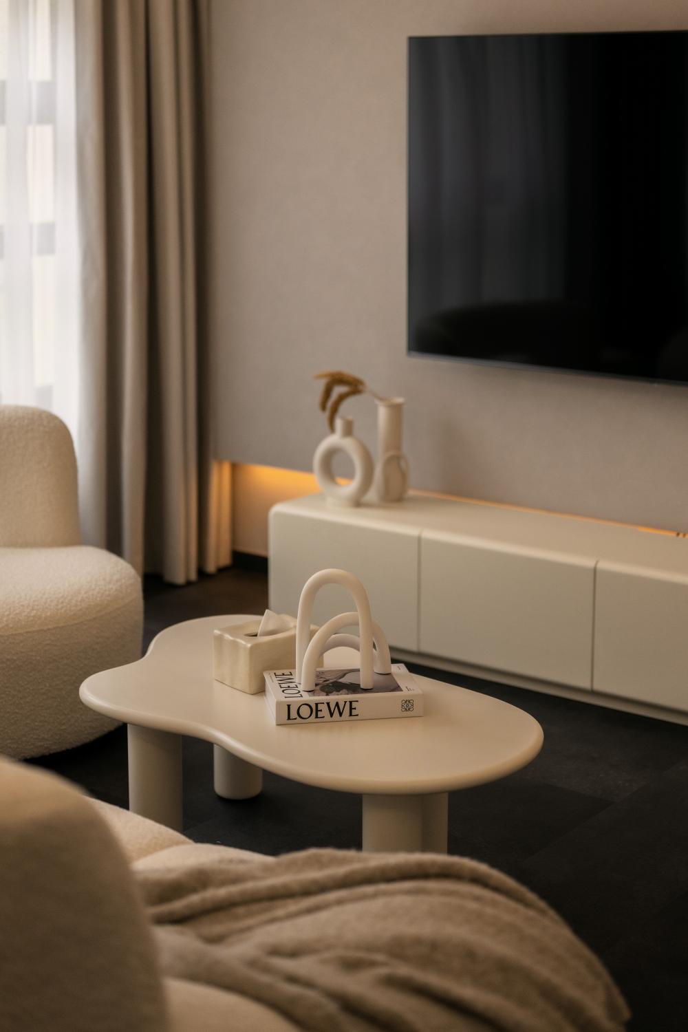 Contemporary Living Room with TV Console and Cove Lighting
