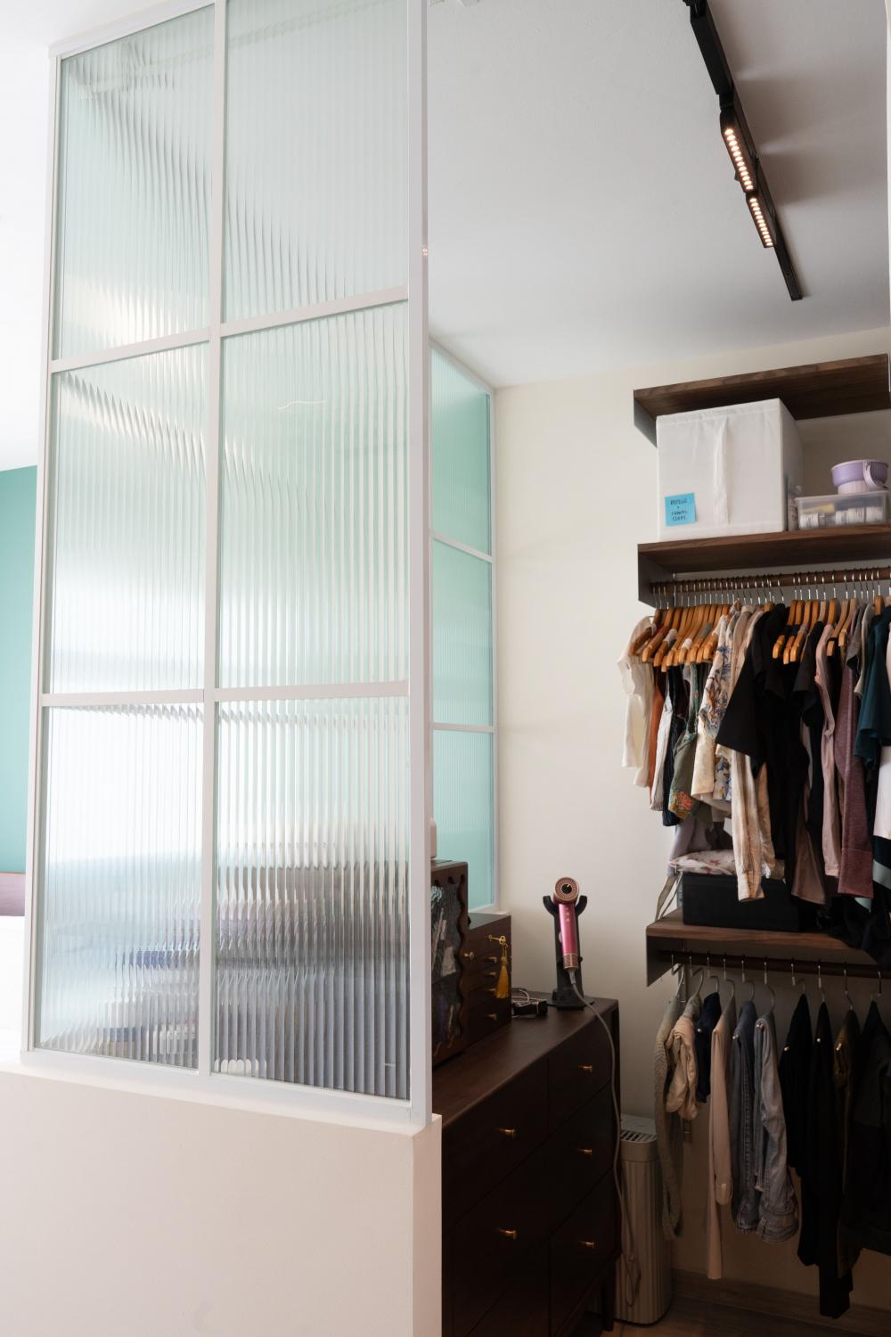 Industrial Bedroom with Bookshelf and Lamps