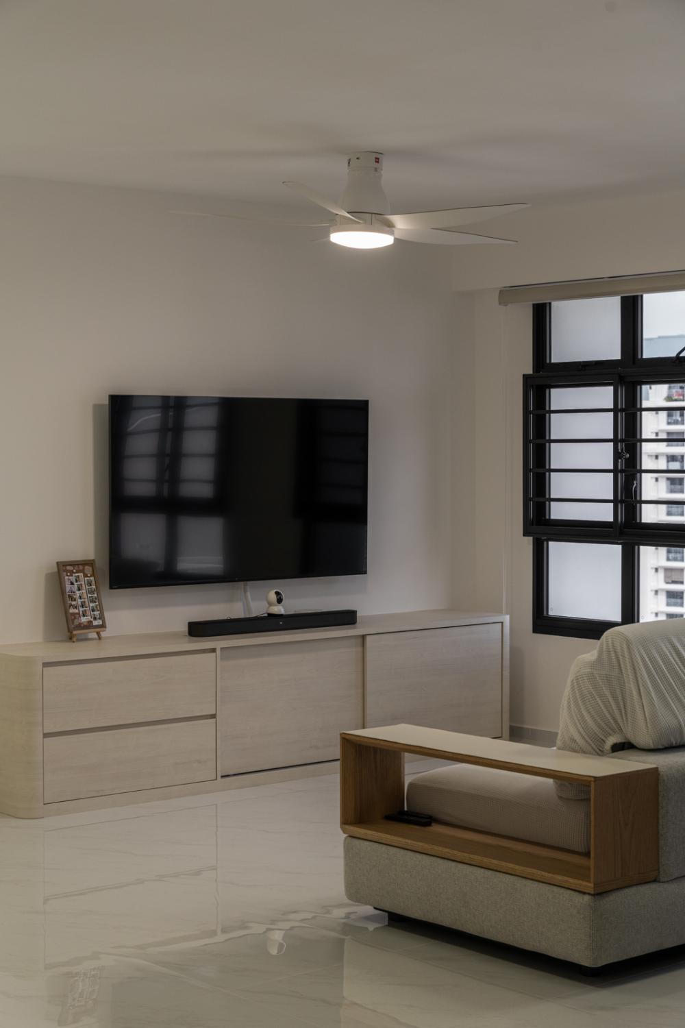 Minimalist Living Room with Homogeneous Tiles and TV Console