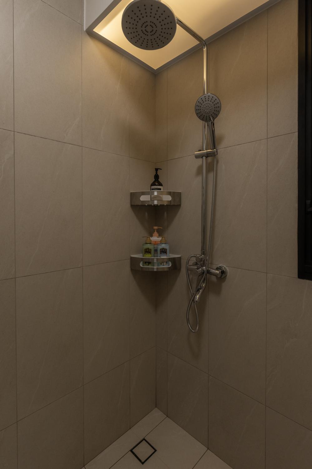 Minimalist Bathroom with Homogeneous Tiles and Showers