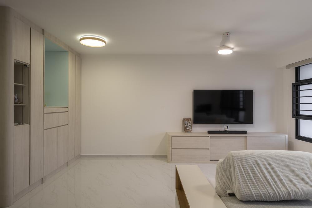 Minimalist Living Room with Homogeneous Tiles and TV Console