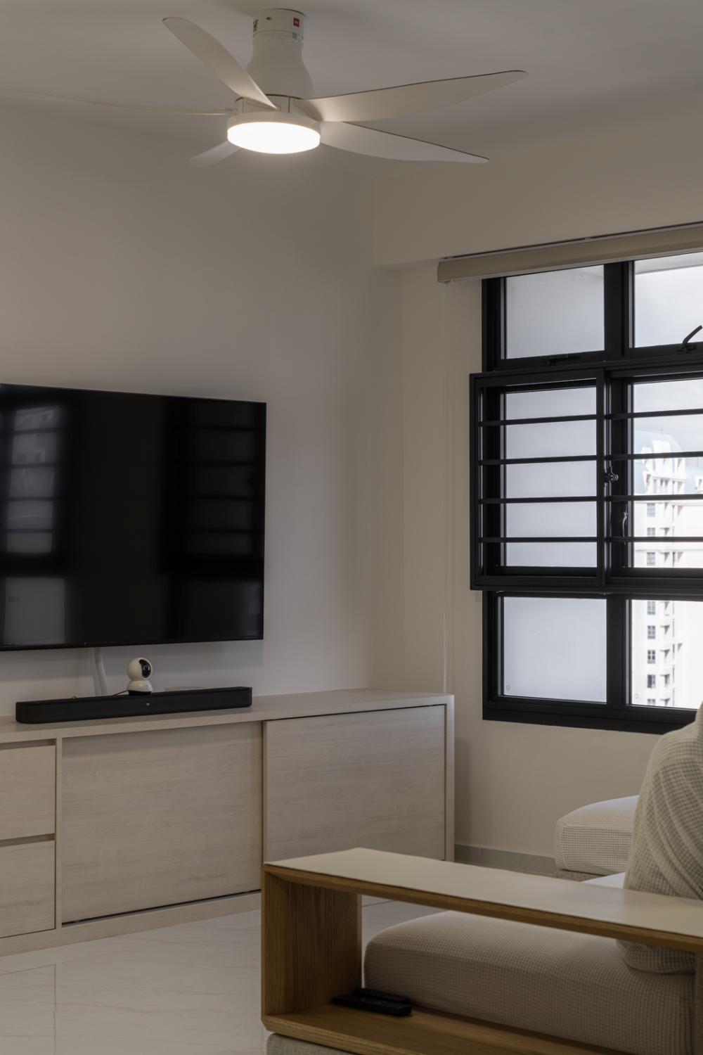 Minimalist Living Room with Homogeneous Tiles and TV Console