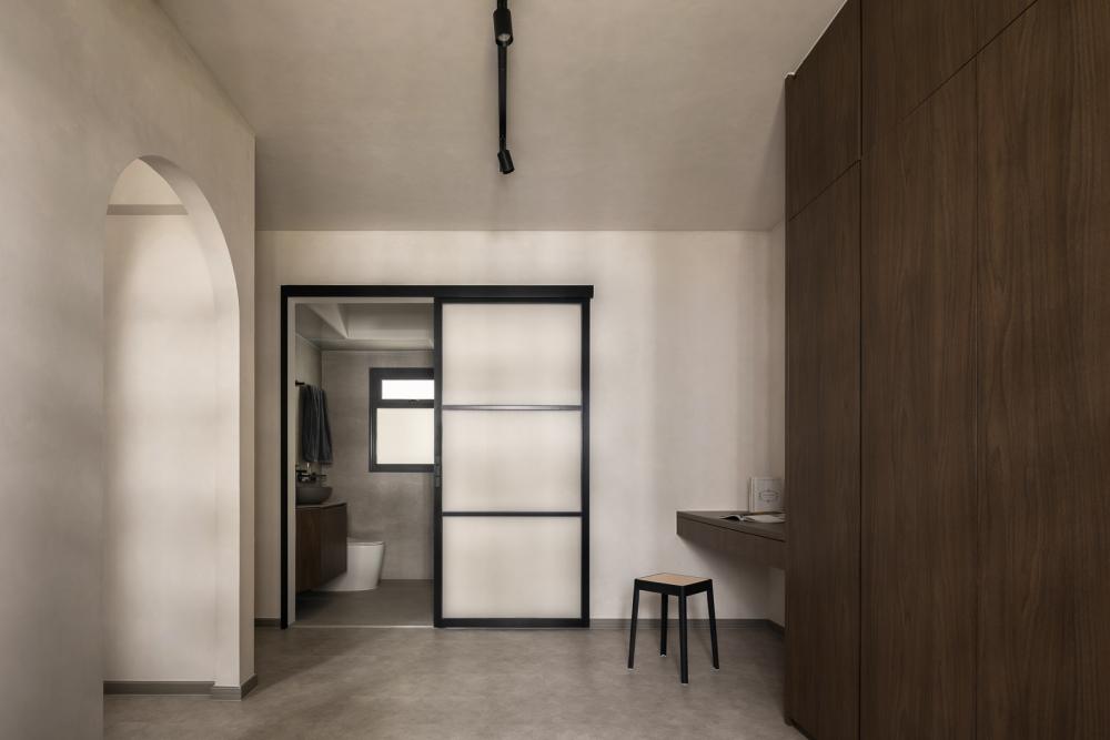 Minimalist Bedroom with Bookshelf and Wardrobe