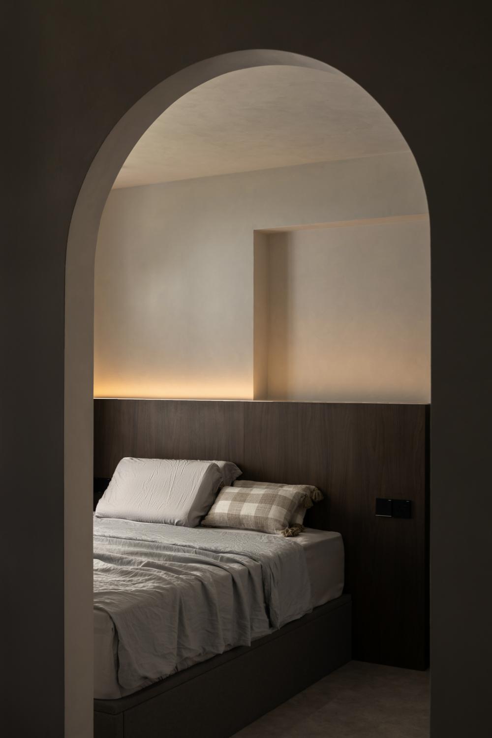 Minimalist Bedroom with Platform Bed and Cement Floor