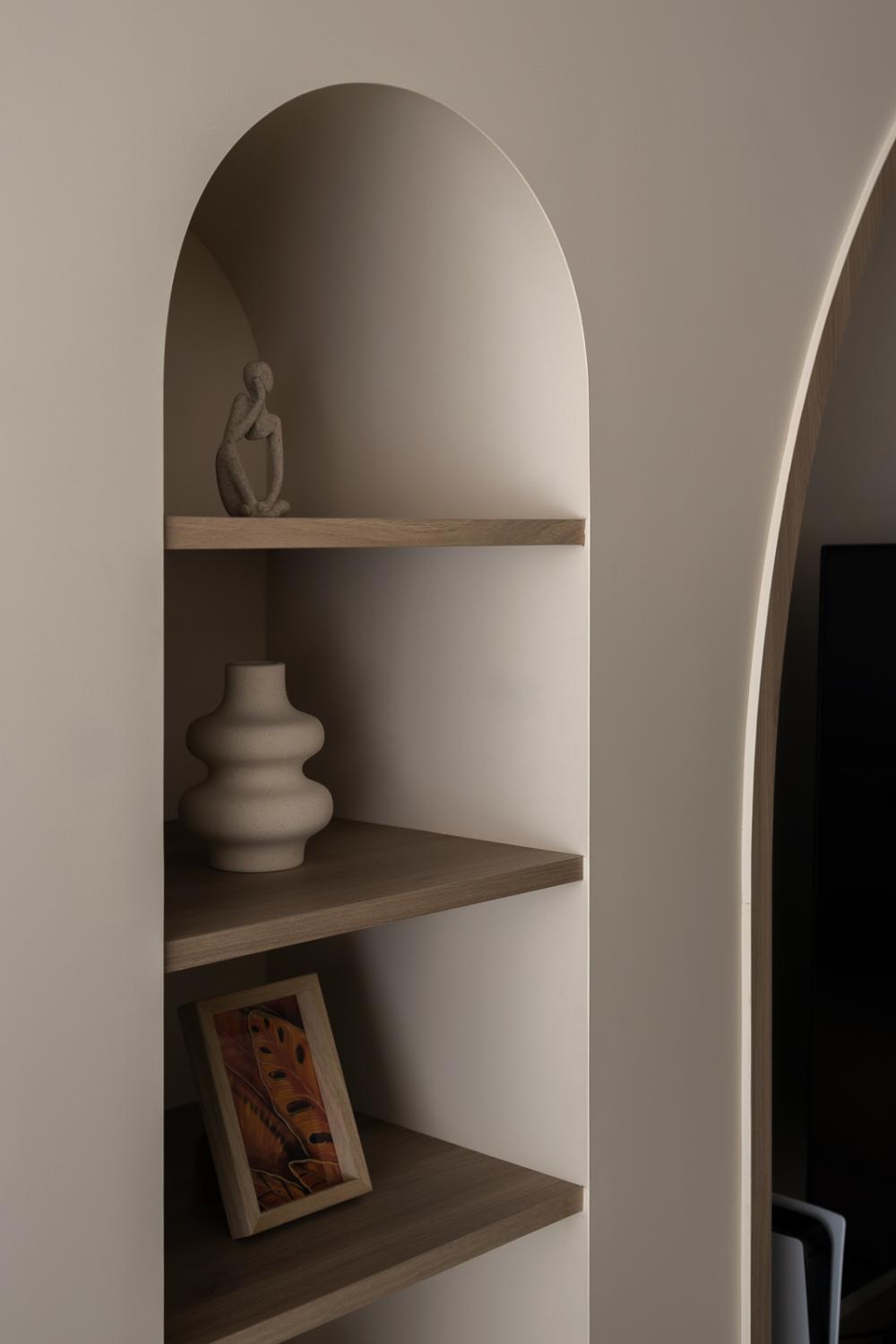 Scandinavian Living Room with Bookshelf and Feature Wall