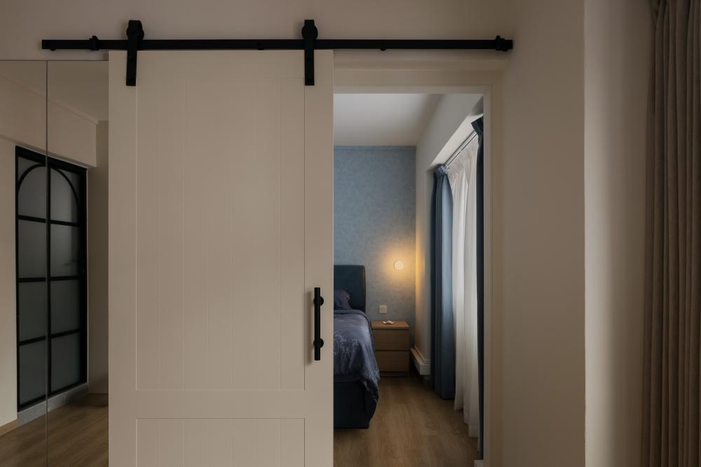 Scandinavian Bedroom with Wood Flooring and Feature Wall