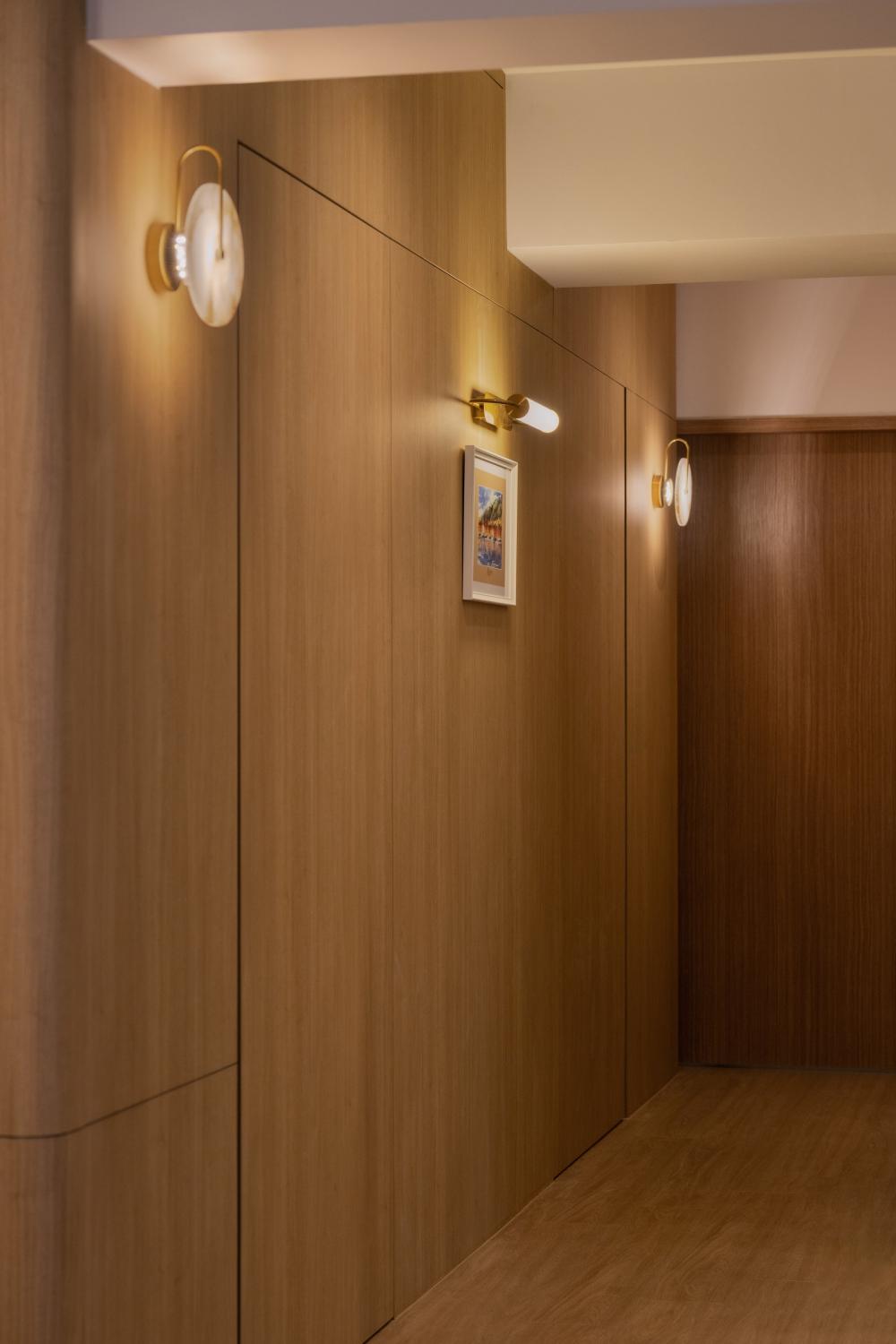 Minimalist Hallway with Lighting and Doors