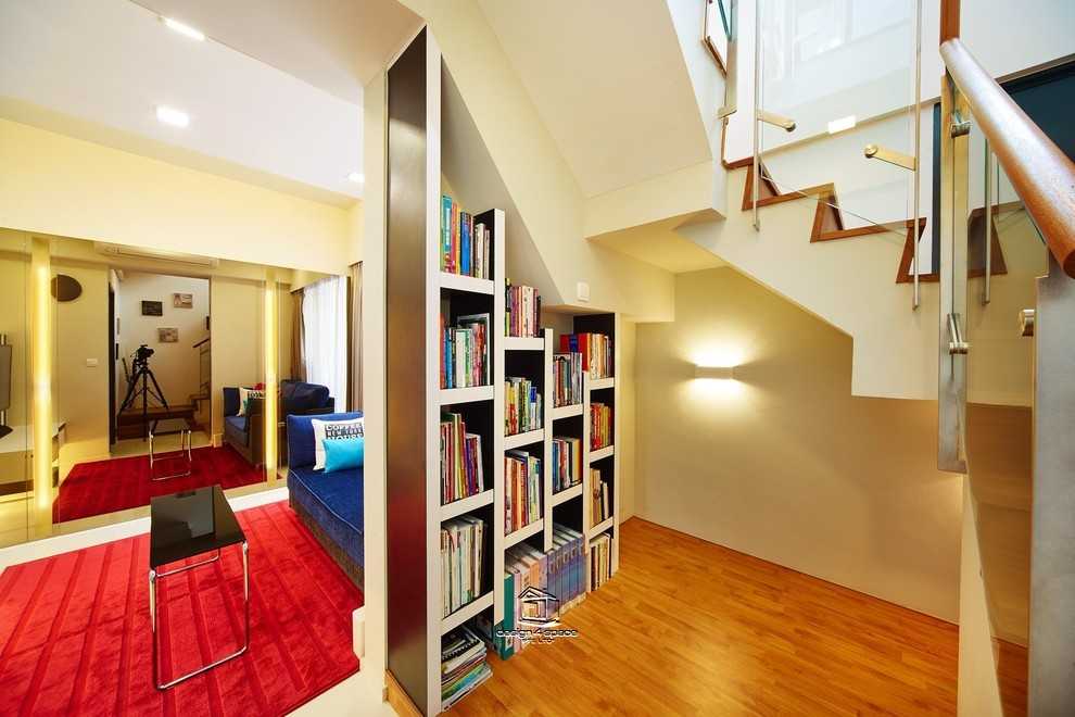 Eclectic Home Office with Bookshelf and Wallpaper