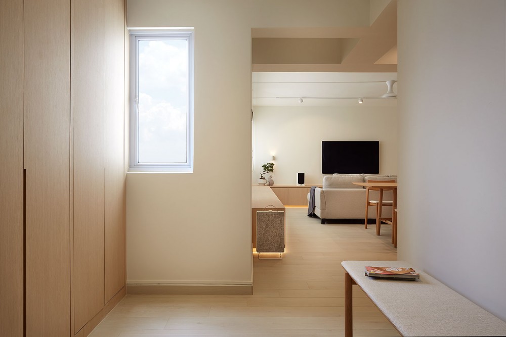Minimalist Entryway with Seating Bench and Small Storage