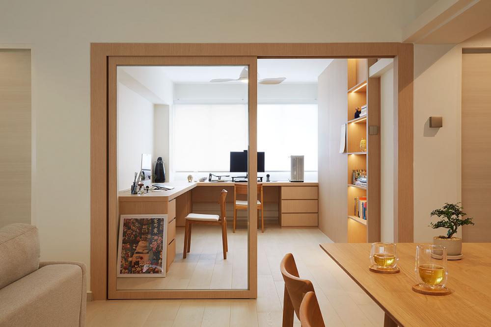 Minimalist Home Office with Bookshelf and Desk