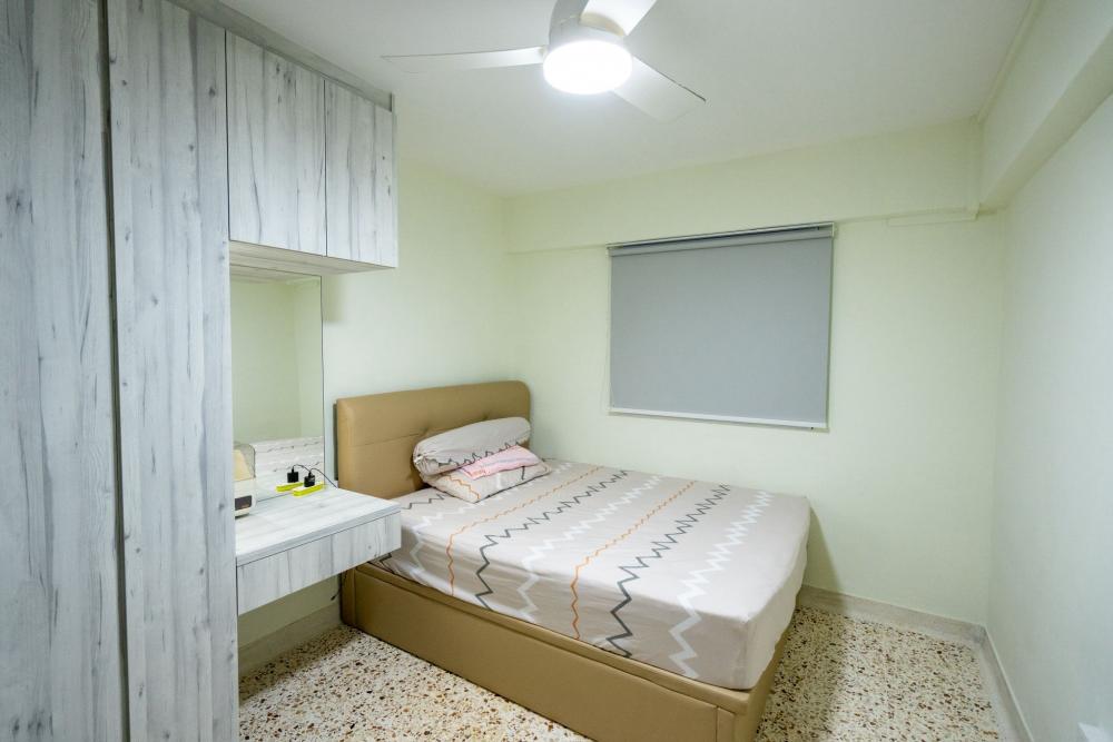 Asian Bedroom with Bookshelf and Wardrobe