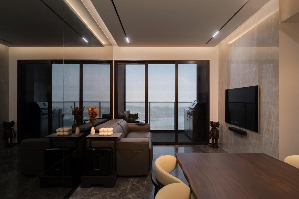 Modern Living Room with Homogeneous Tiles and Feature Wall