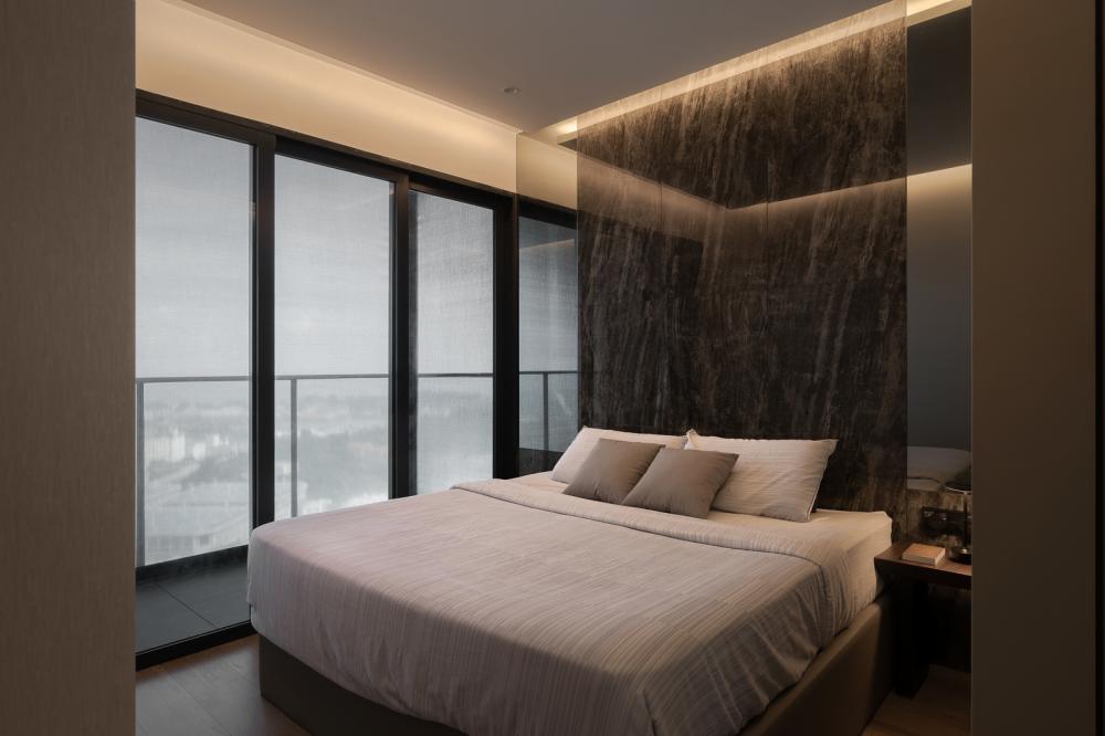 Modern Bedroom with Wood Flooring and Feature Wall