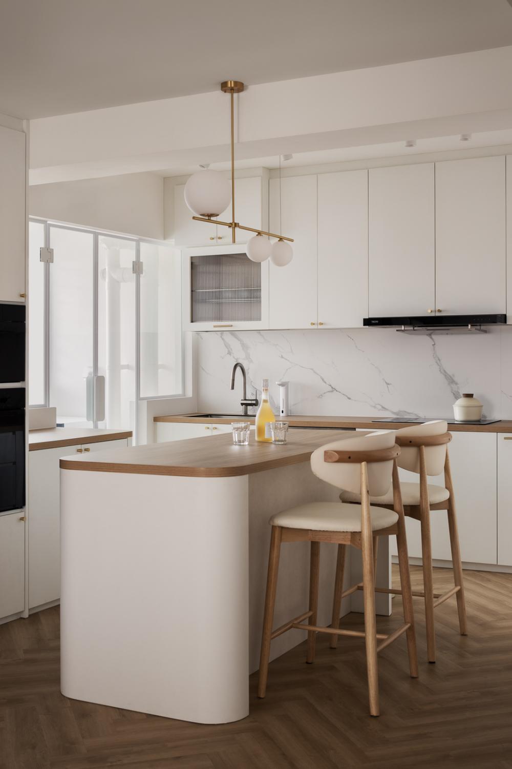 Scandinavian Kitchen with Herringbone Tiling and Wood Flooring
