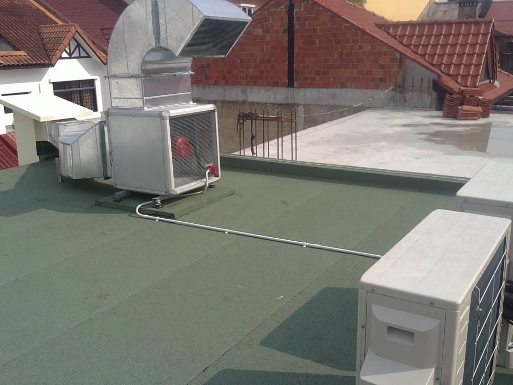 Asian Rooftop with Awning and Outdoor Chairs