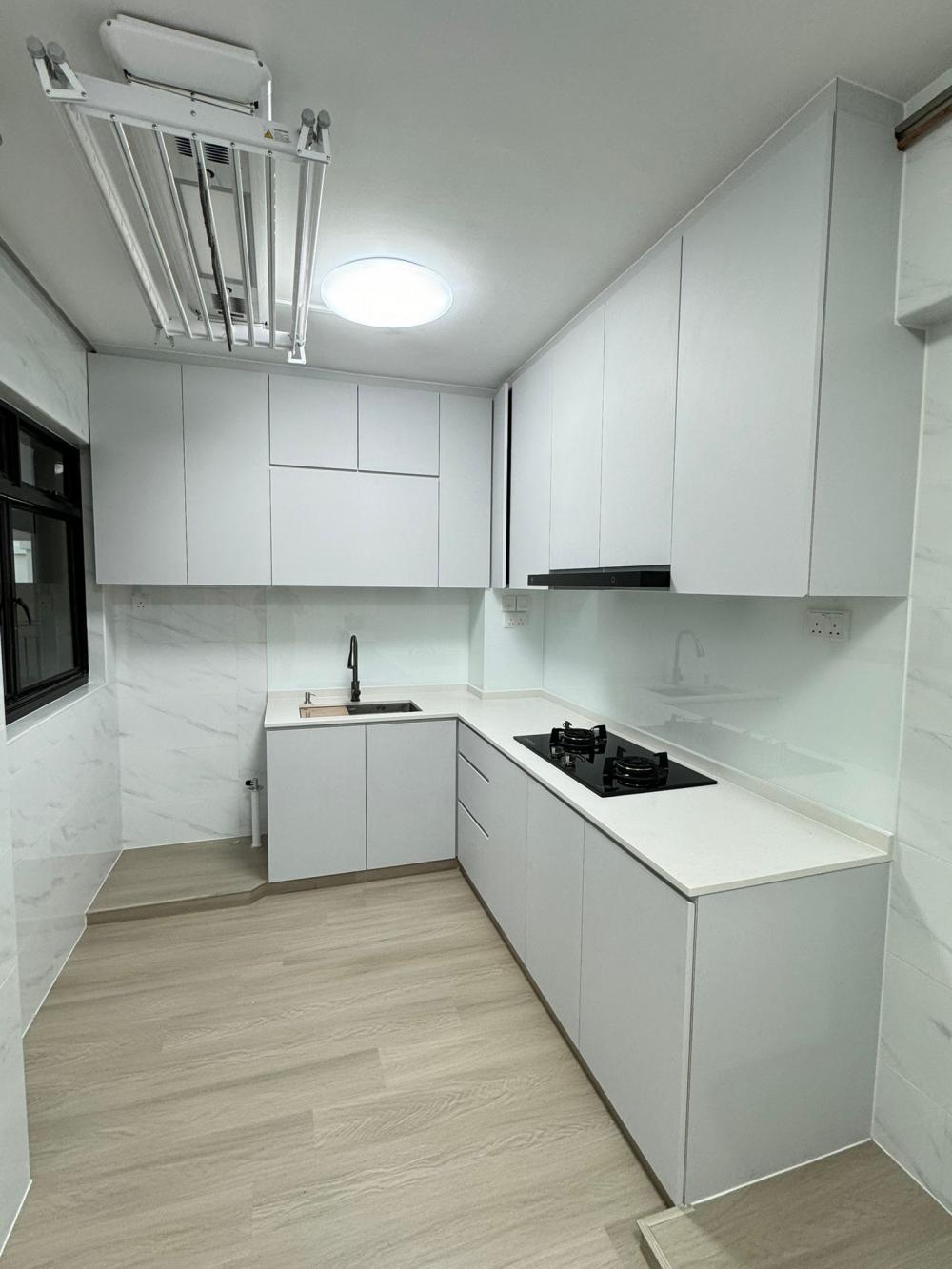 Minimalist Kitchen with Wood Flooring and Mosaic