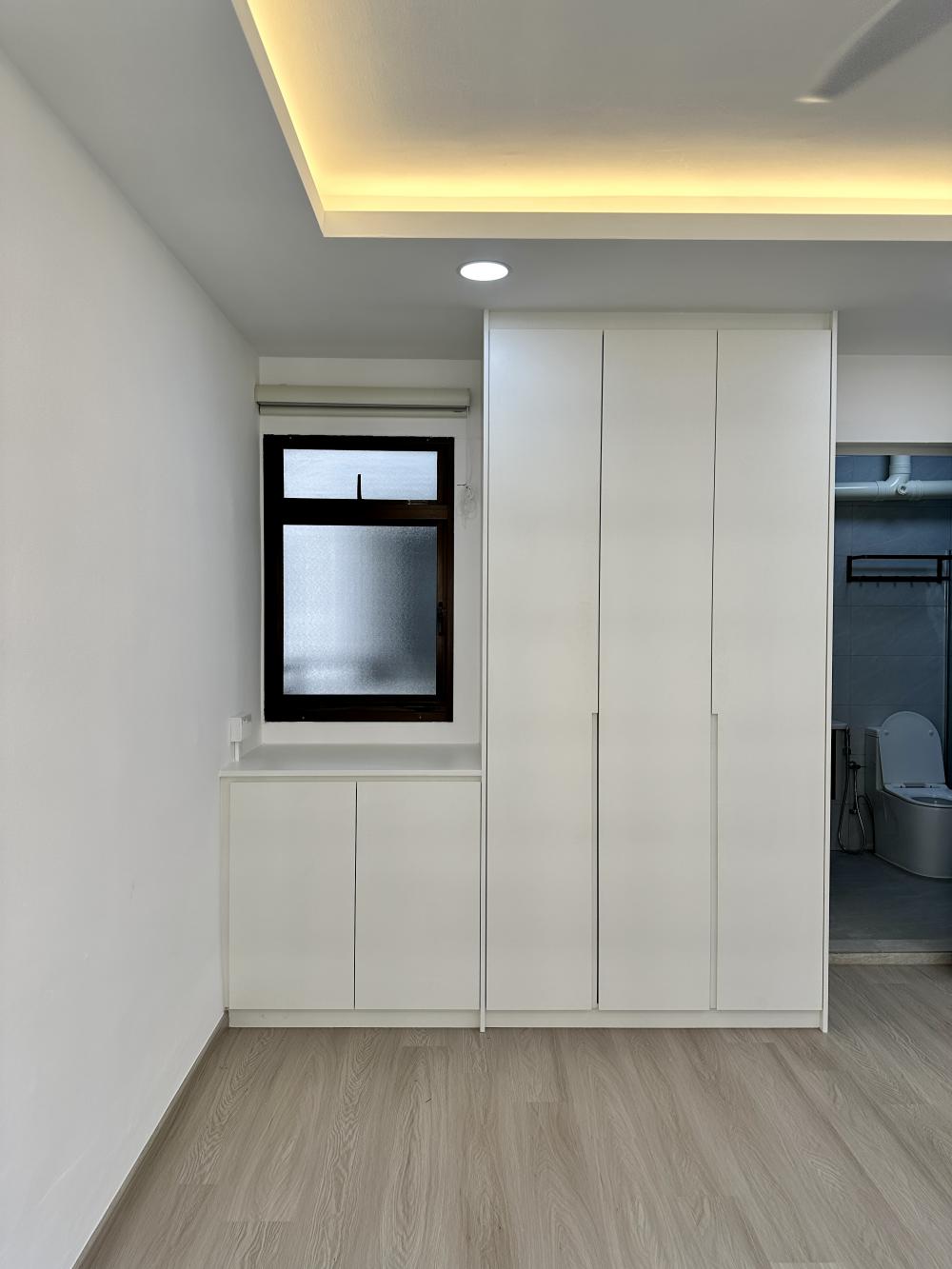 Minimalist Bedroom with Wardrobe and Roller Blinds