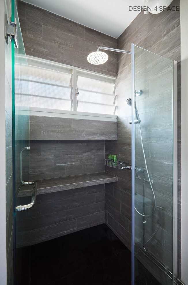 Industrial Bathroom with Homogeneous Tiles and Mirror