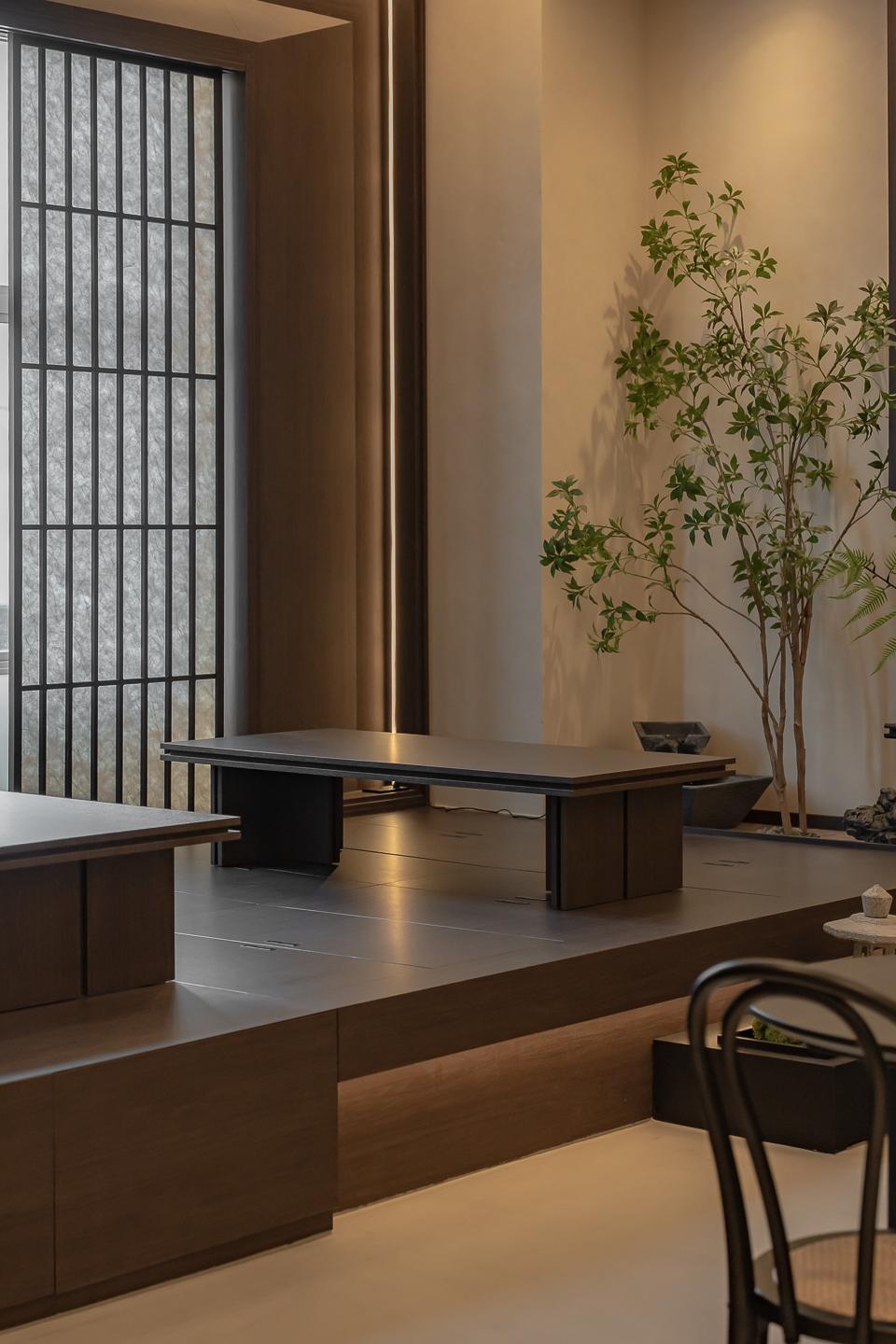 Asian Studio with Feature Wall and Storage Cabinets