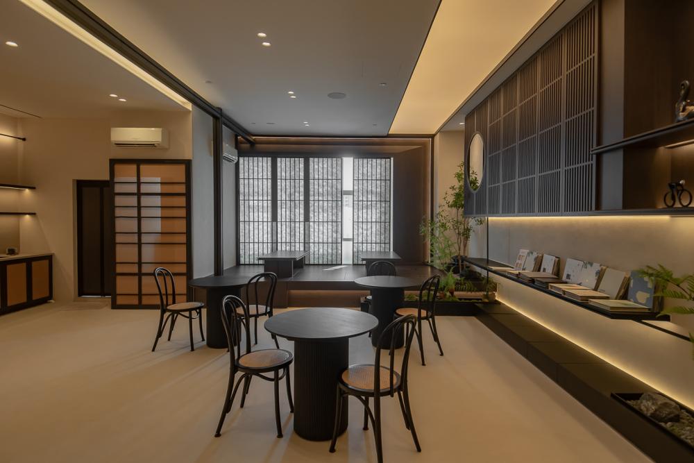 Asian Studio with Bookshelf and Coffee Table