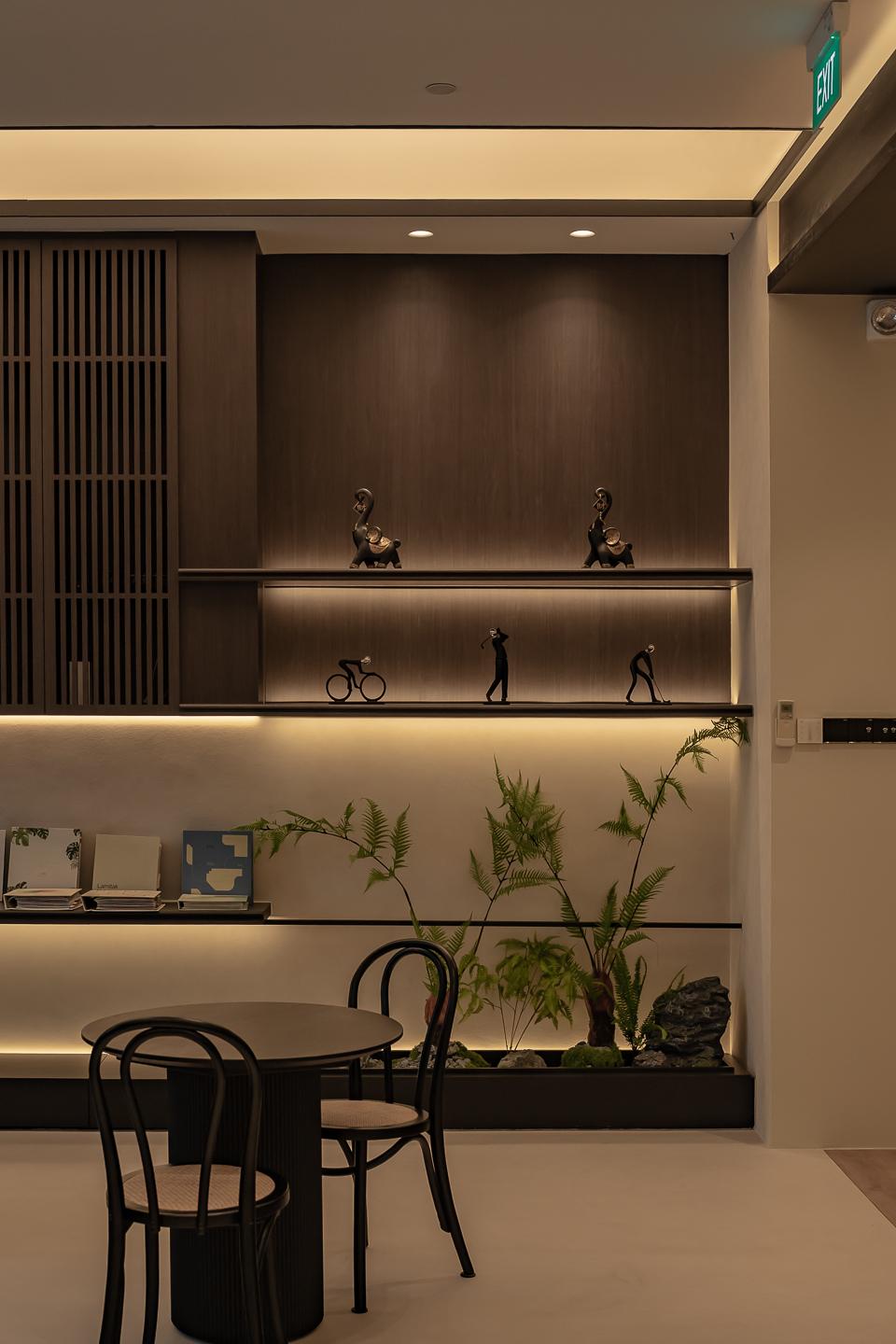Asian Studio with Bookshelf and Feature Wall