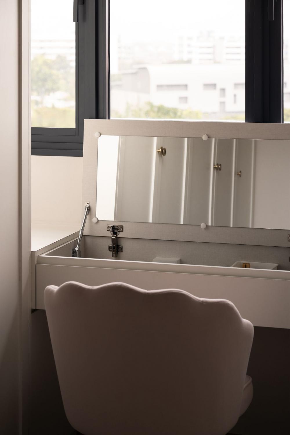 Minimalist Bedroom with Mirror and Desk Chairs