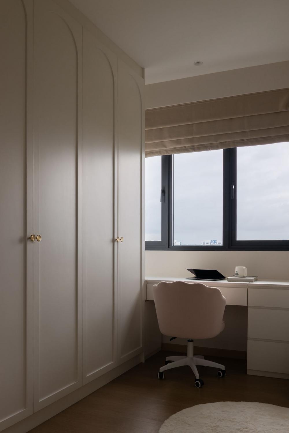 Minimalist Home Office with Storage Cabinets and Computer