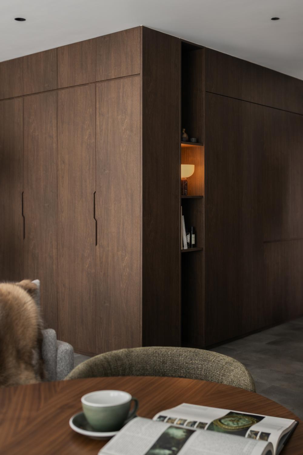Minimalist Entryway with Homogeneous Tiles and Storage Cabinets