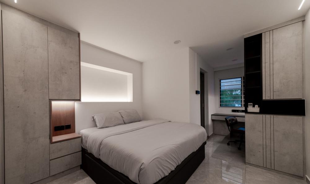 Modern Bedroom with Bookshelf and Homogeneous Tiles