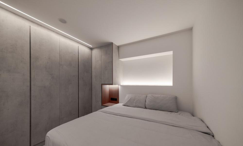 Modern Bedroom with Cove Lighting and Drop Ceiling