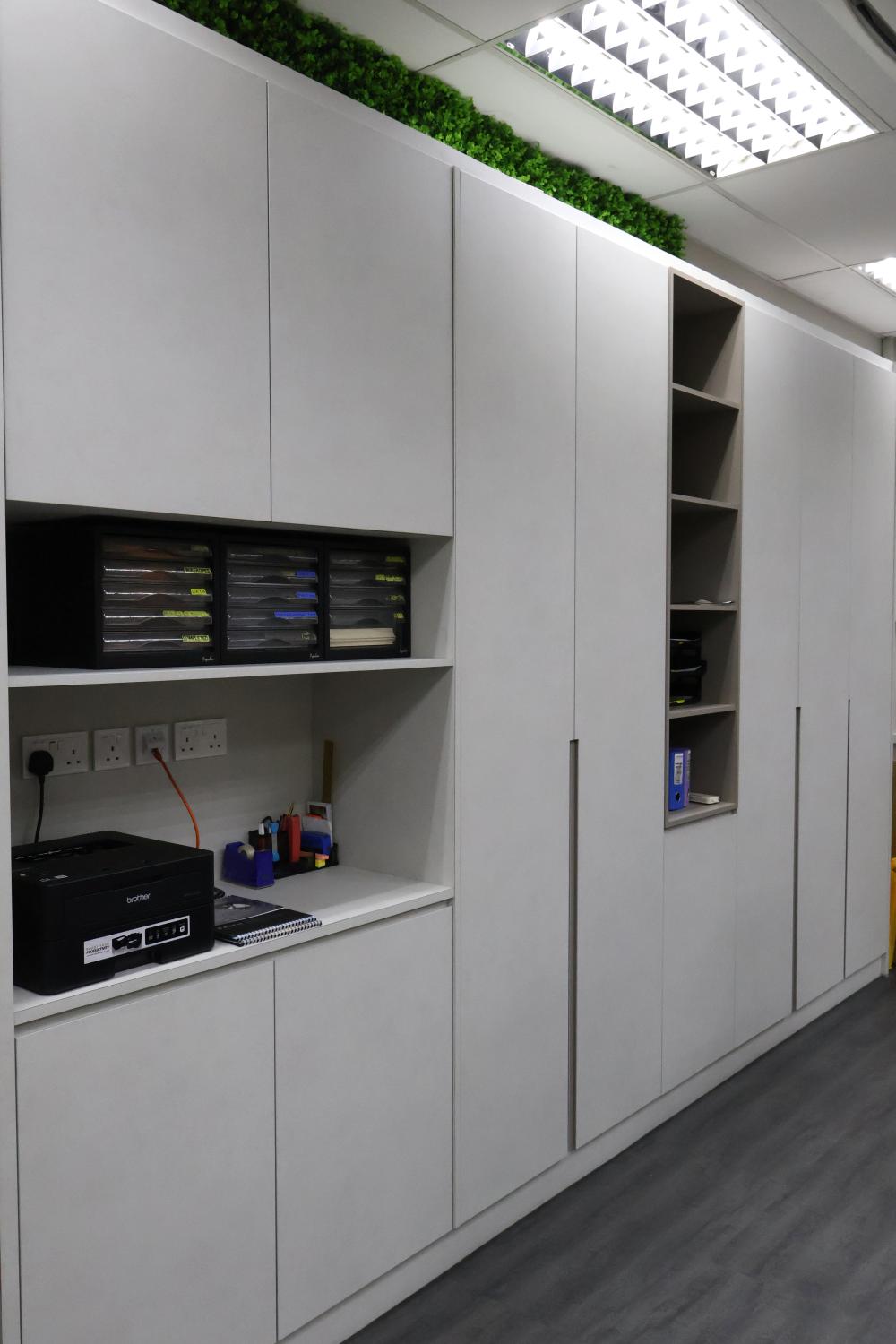 Minimalist Office with Bookshelf and Storage Cabinets