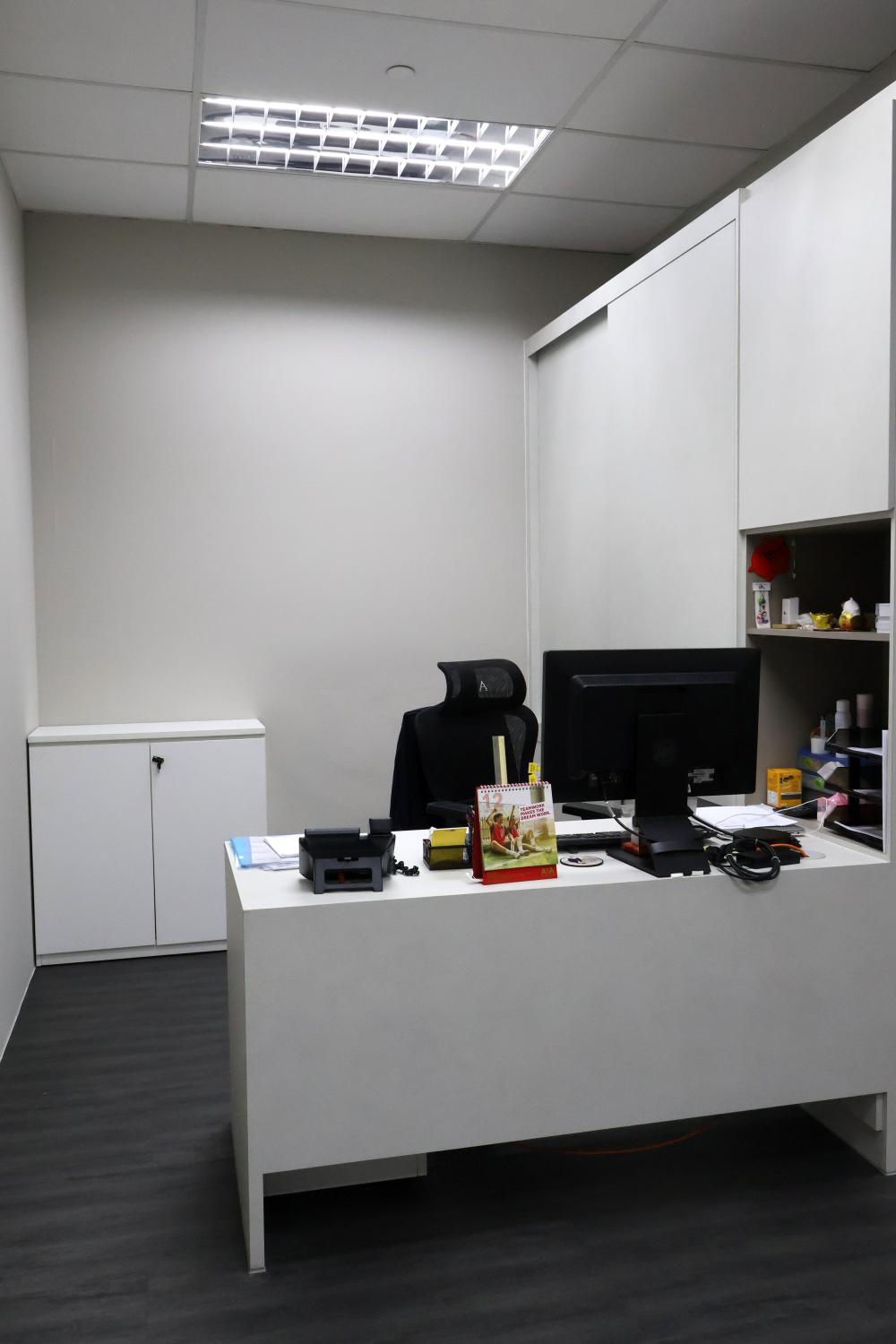 Minimalist Office with Bookshelf and Desk