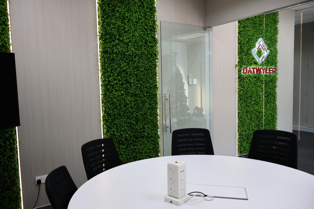Minimalist Office with Feature Wall and Green Wall