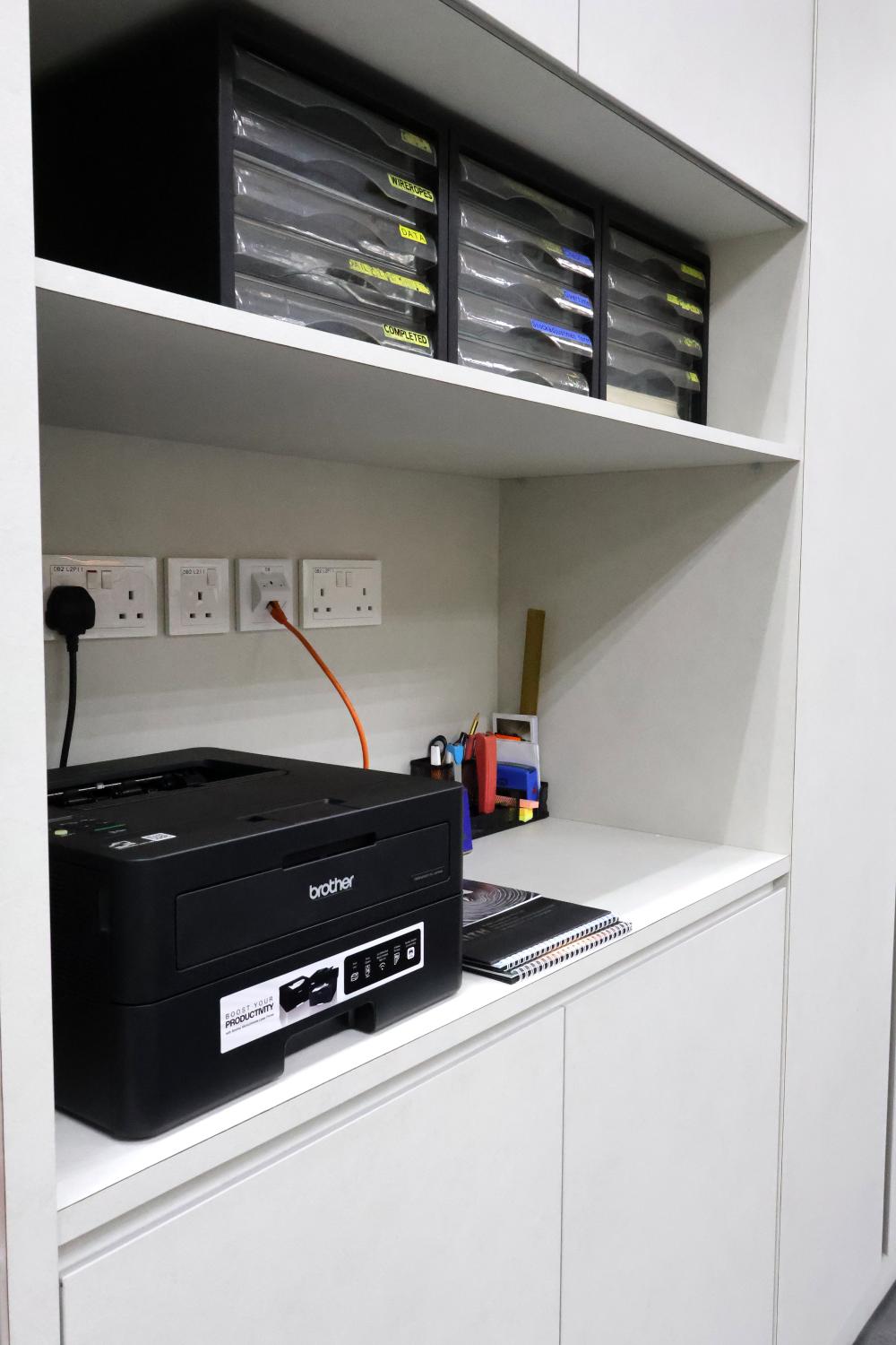 Minimalist Office with Bookshelf and Storage Cabinets