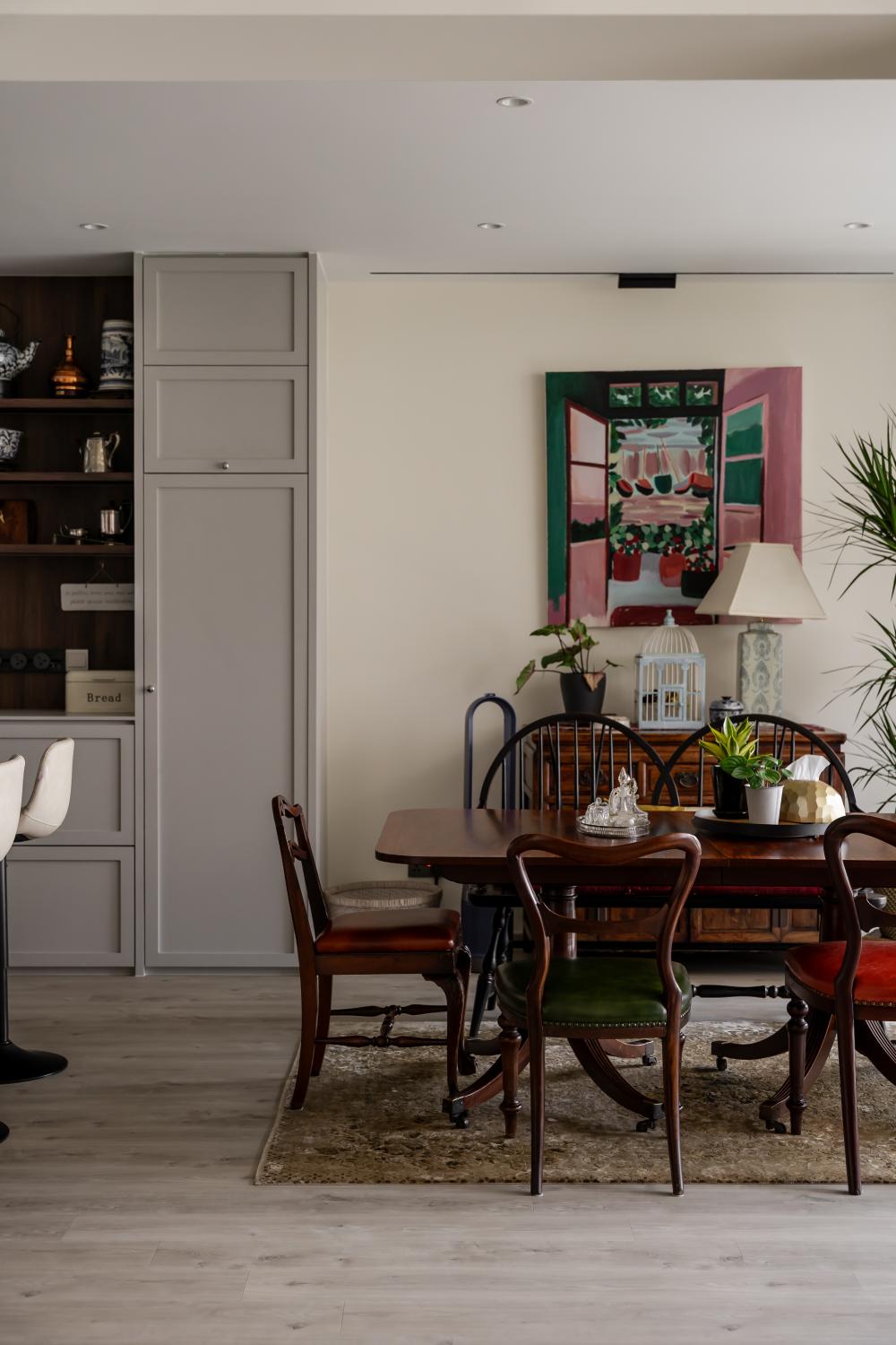 Vintage Dining Room with Drop Light and Artwork