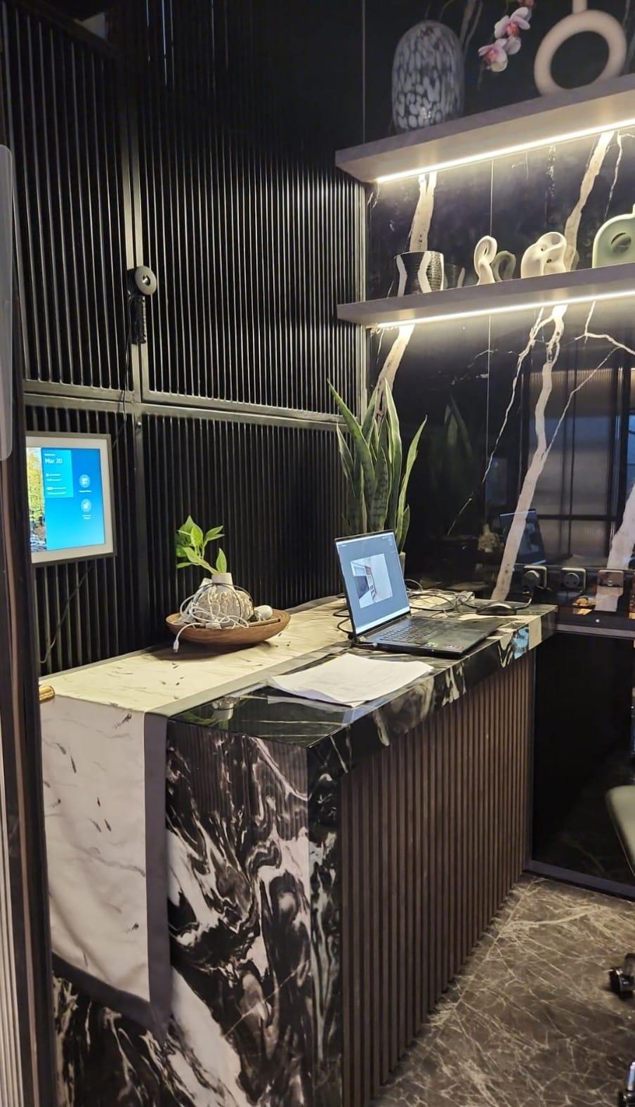 Modern Home Office with Bookshelf and Computer