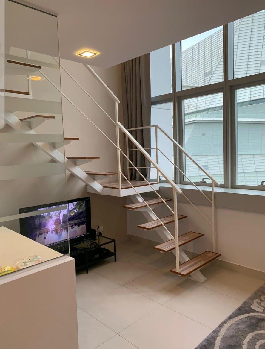 Minimalist Living Room with Staircase and Platform