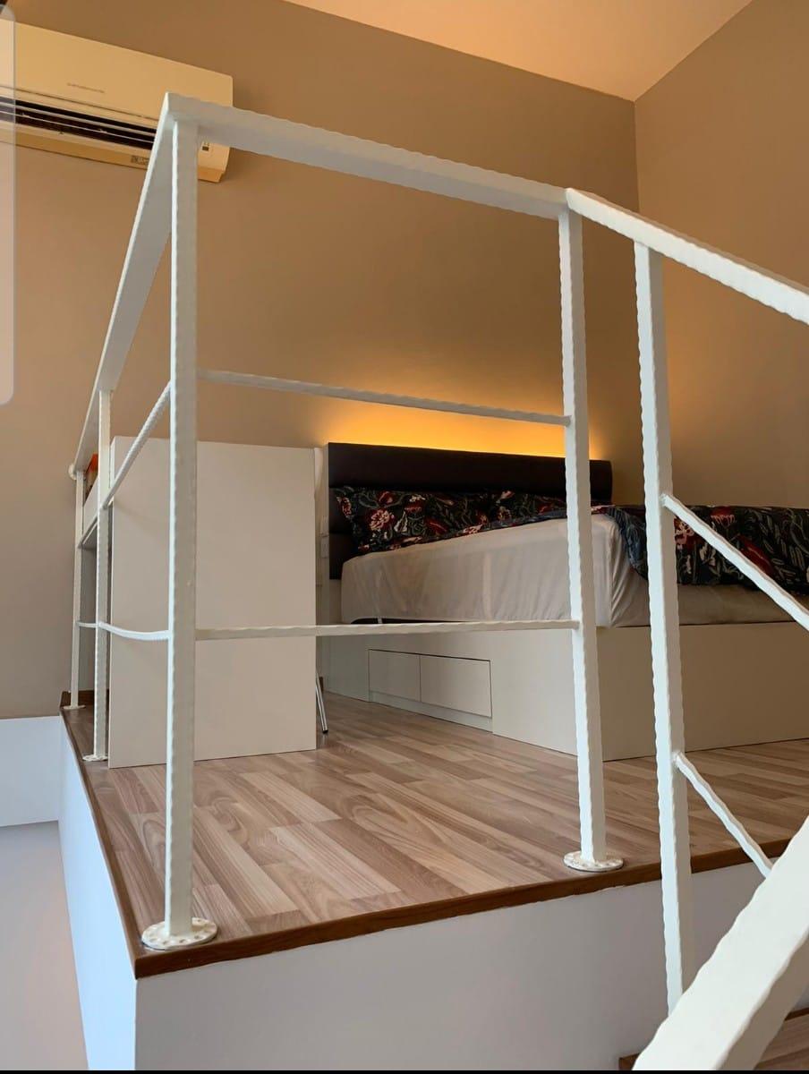 Minimalist Mezzanine with Loft and Open Storage