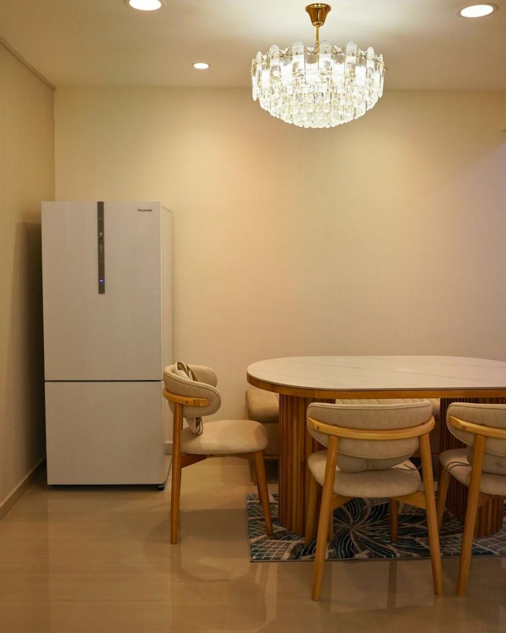 Modern Dining Room with Drop Light and Cove Lighting