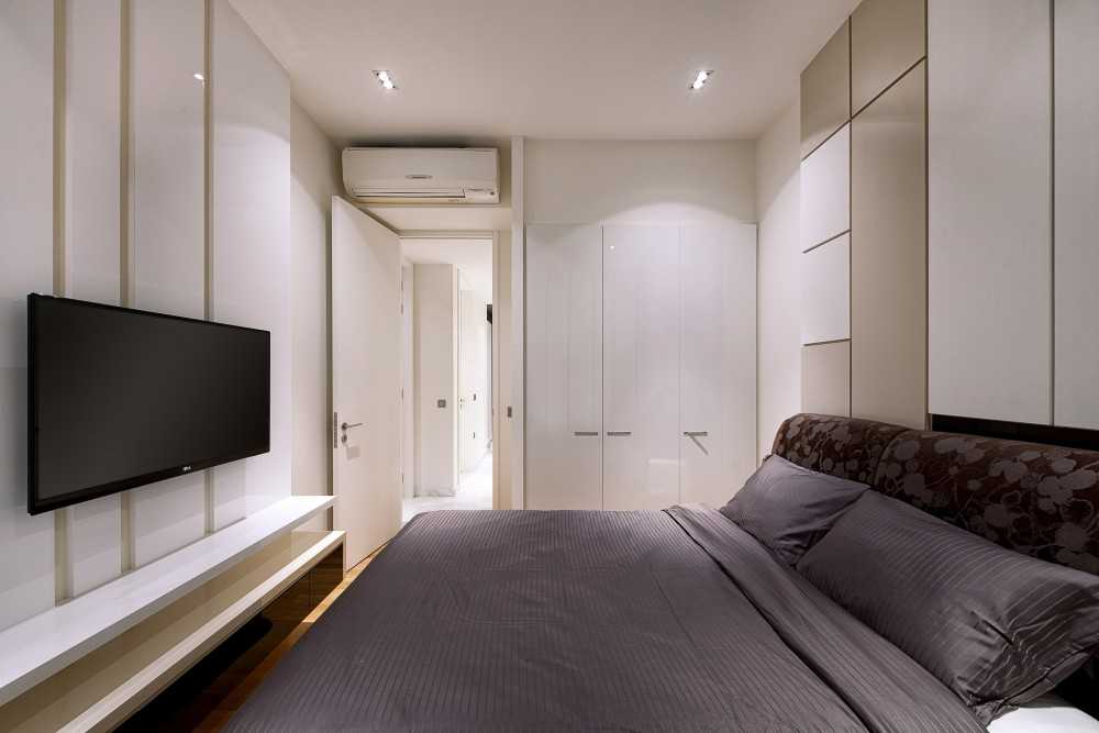 Modern Bedroom with Wardrobe and TV
