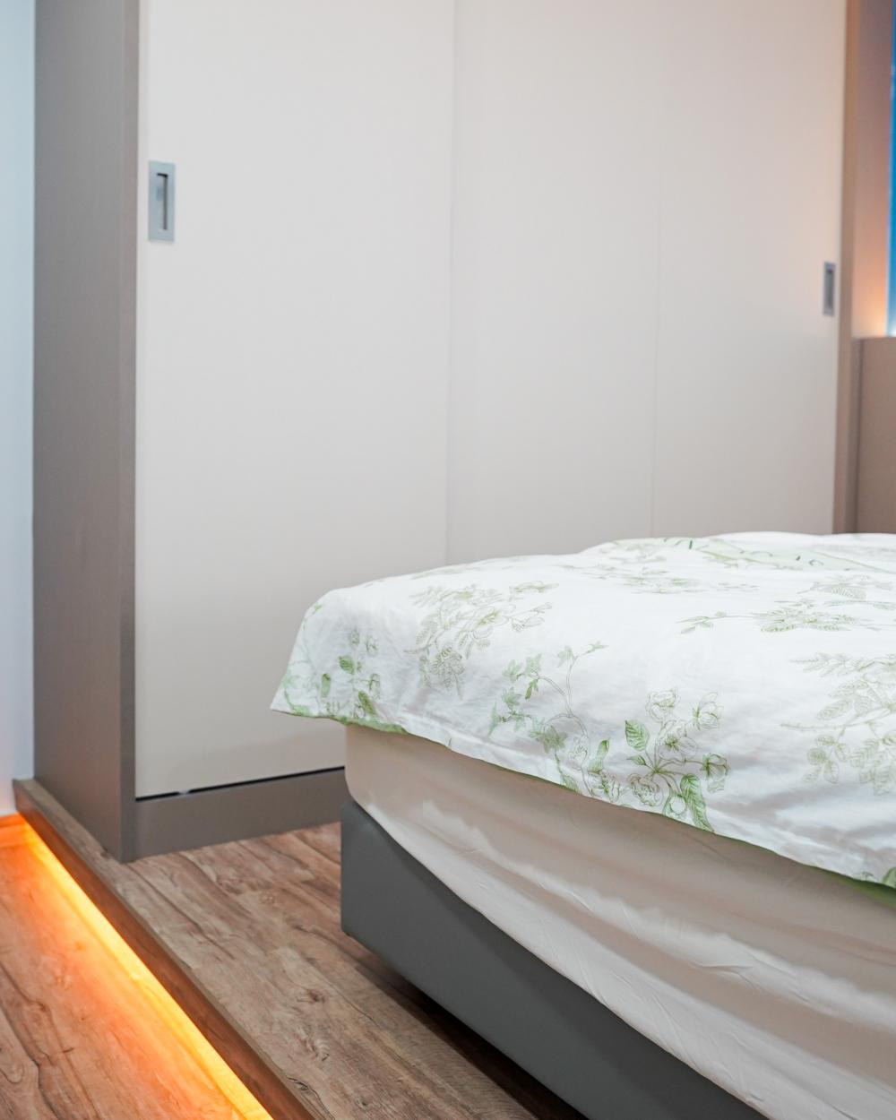 Transitional Bedroom with Bookshelf and Platform Bed
